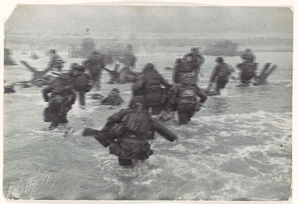 Robert Capa. The American troops land on Omaha Beach on D-Day, Normandy, France, June 6, 1944 ©Robert Capa/Centro Internacional de Fotografía/Magnum Photos