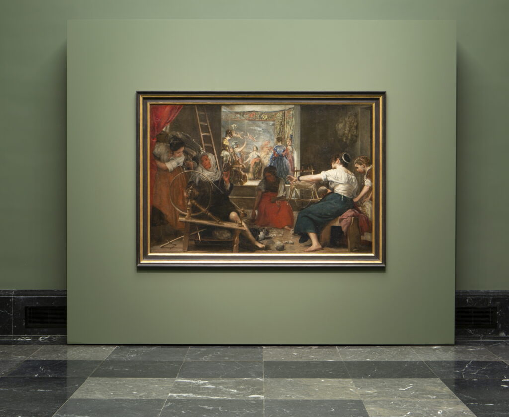 Imagen de Las hilanderas de Velázquez con el nuevo enmarcado Foto © Museo Nacional del Prado.