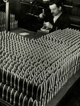 Margaret Bourke-White. Czech worker stamping 15-cm-shells in a Skoda munitions factory, 1938. © Time & Life / Getty Images 
