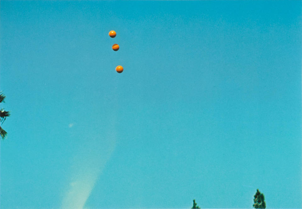 John Baldessari. Throwing three balls in the air to get a straight line, 1973